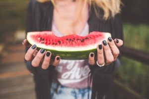 woman with a melon